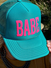 Load image into Gallery viewer, Babe in Pink Puff on Turquoise Trucker Cap
